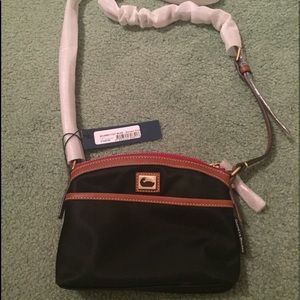 Dooney & Bourke domed crossbody purse. NWT